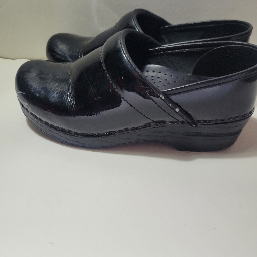 Dansko clog black patent stapled professional  shoes